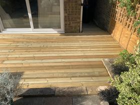 decking by a patio 